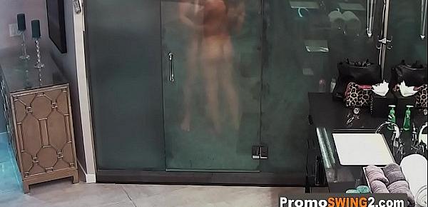  Horny swinger couple is having sex on the shower.